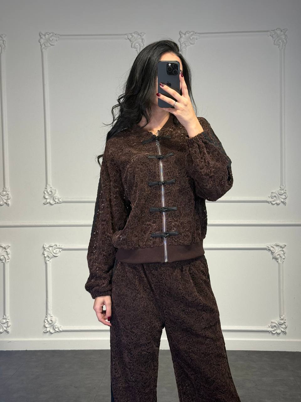 coordinato tuta con chiusura alamari