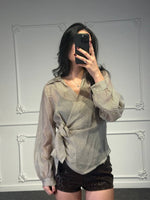 camicia con fiocco laterale