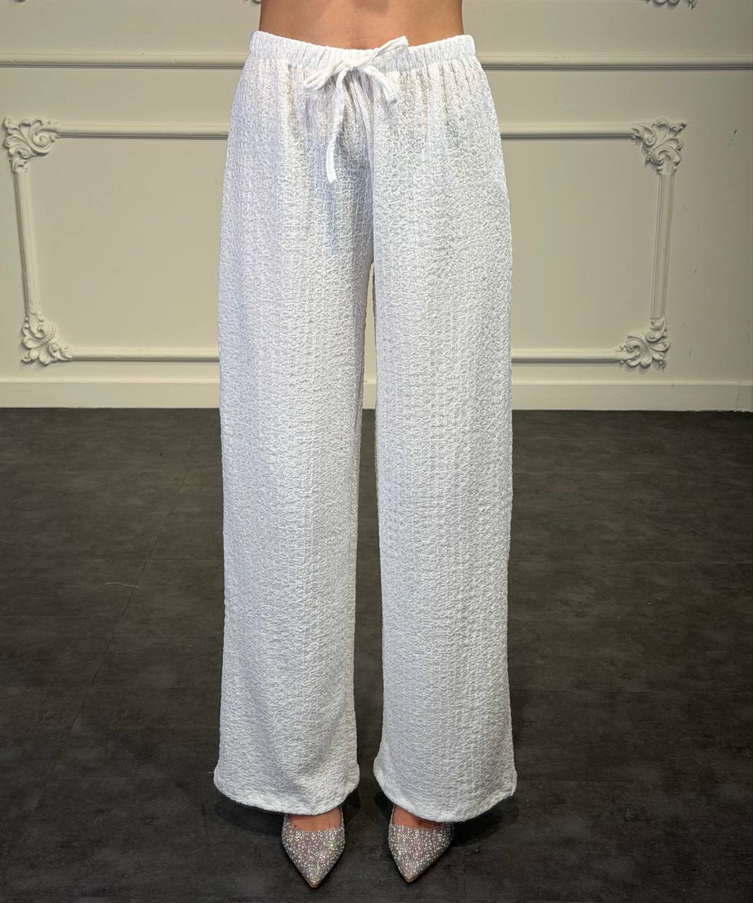 pantaloni con trama lavorata