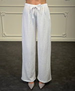 pantaloni con trama lavorata