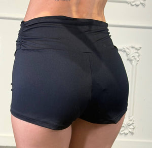 culotte lisa con drappeggio laterale