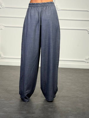 Pantaloni palazzo a vita bassa con pinces frontali