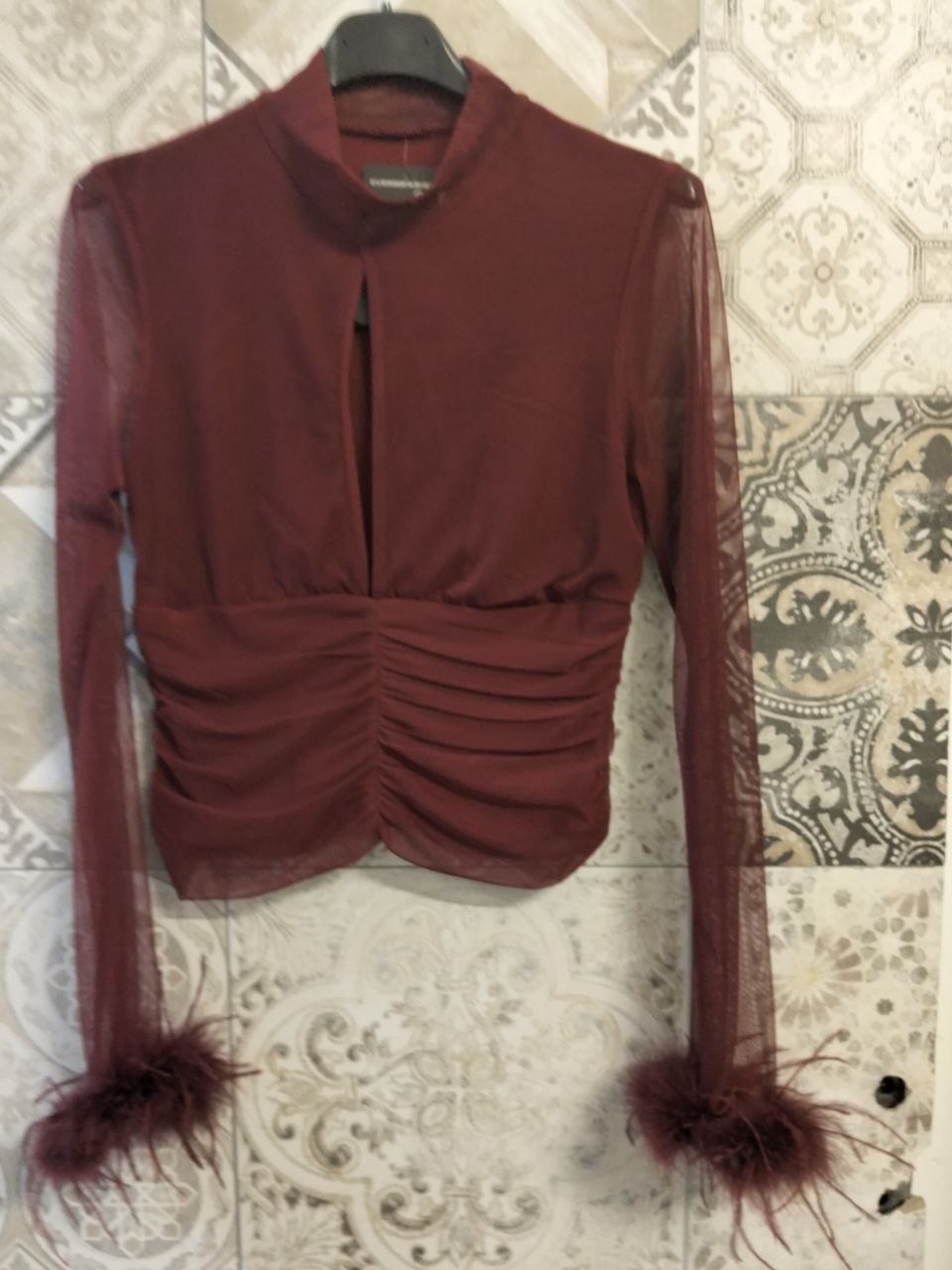 maglia giselle con piume