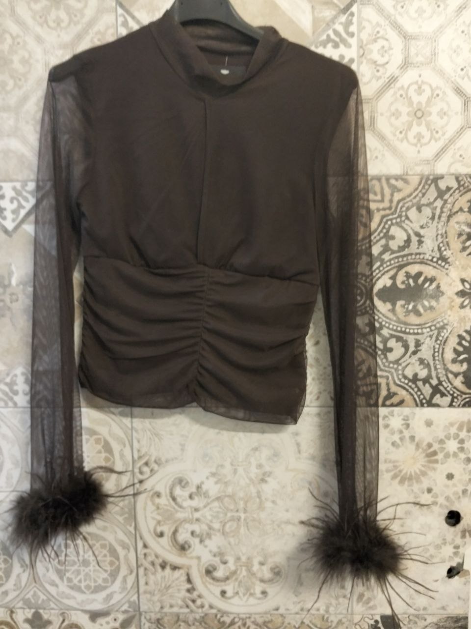 maglia giselle con piume