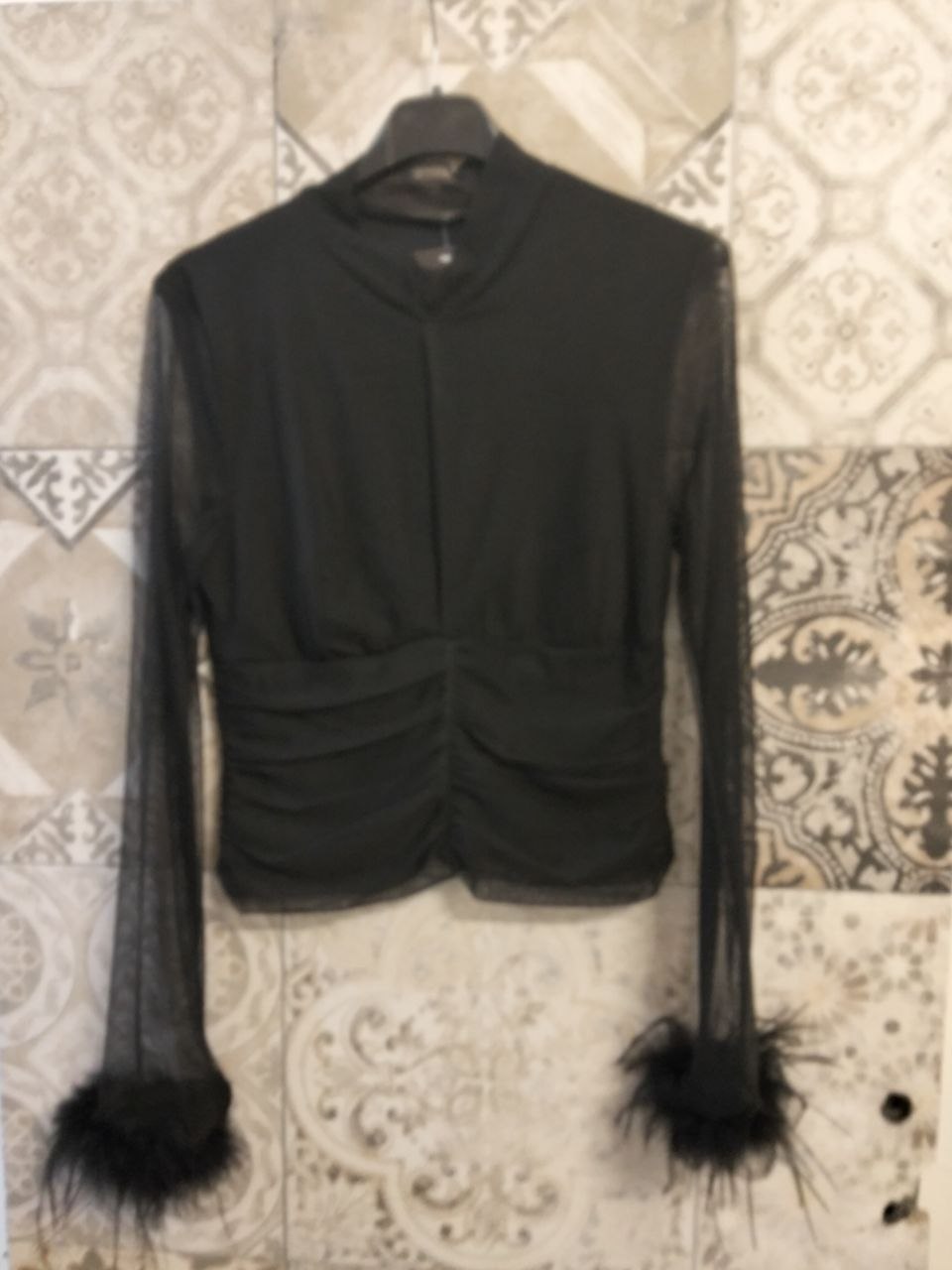 maglia giselle con piume