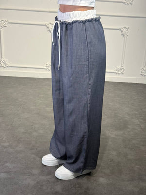 Pantalone palazzo con doppio elastico in vita e coulisse