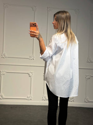 Camicia oversize e fondo stondato