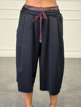 bermuda con bordo pelle