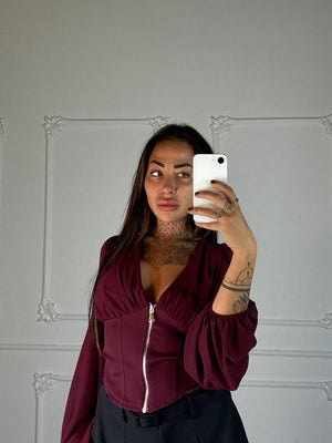 Top corsetto con zip frontale