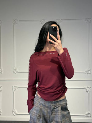 maglia a barca con borchie