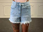shorts con perle