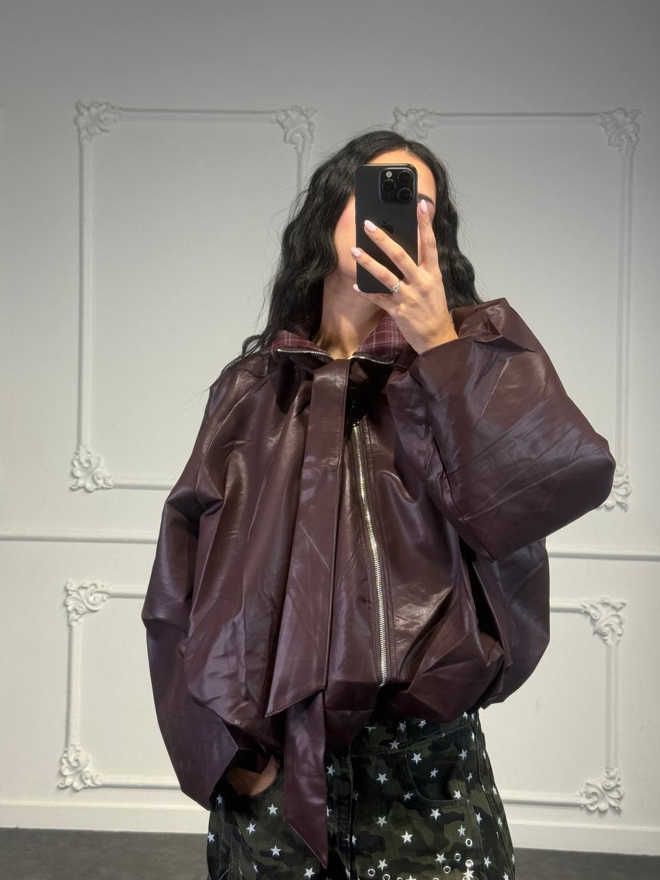 bomber in pelle con fiocco