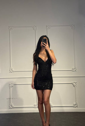 Abito corto con paillettes e scollo a V profondo