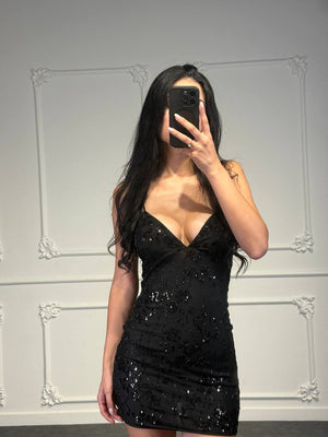 Abito corto con paillettes e scollo a V profondo