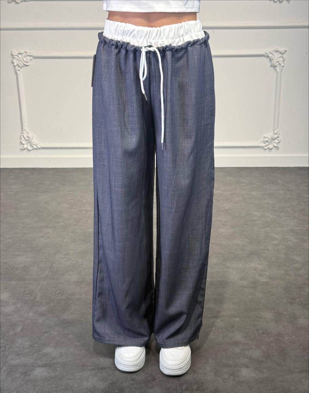 Pantalone palazzo con doppio elastico in vita e coulisse