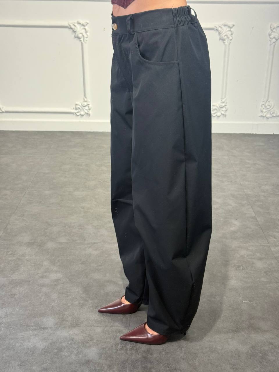 Pantalone balloon a vita alta con pinces e tasche laterali