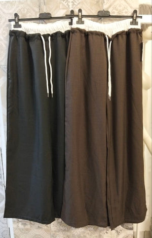 Pantalone palazzo con doppio elastico in vita e coulisse