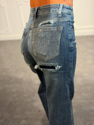 Jeans wide leg con dettagli destroyed e tasca posteriore con strass