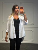 Camicia oversize e fondo stondato
