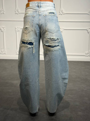 Jeans balloon con strass all-over e dettagli destroyed sul retro
