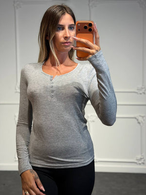 Maglia basic con scollo serafino, bottoni frontali e maniche lunghe
