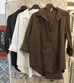 Camicia oversize e fondo stondato